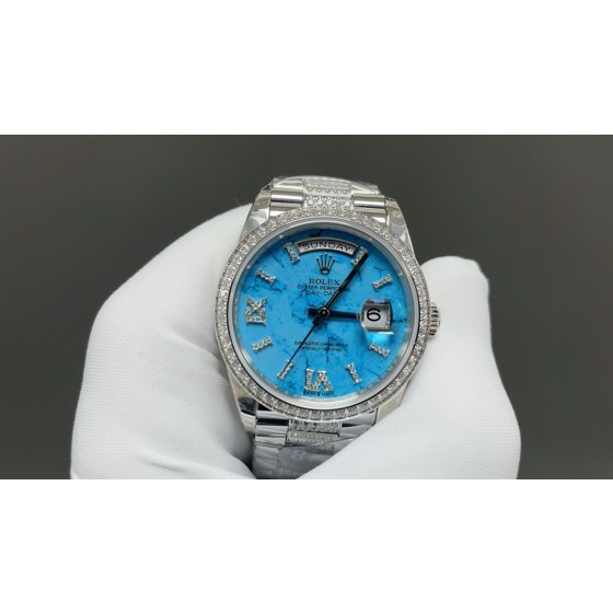 Sunday Calendar series women's watch, turquoise dial, diamond-set bezel, 36mm, diamond-set silver President-style bracelet.